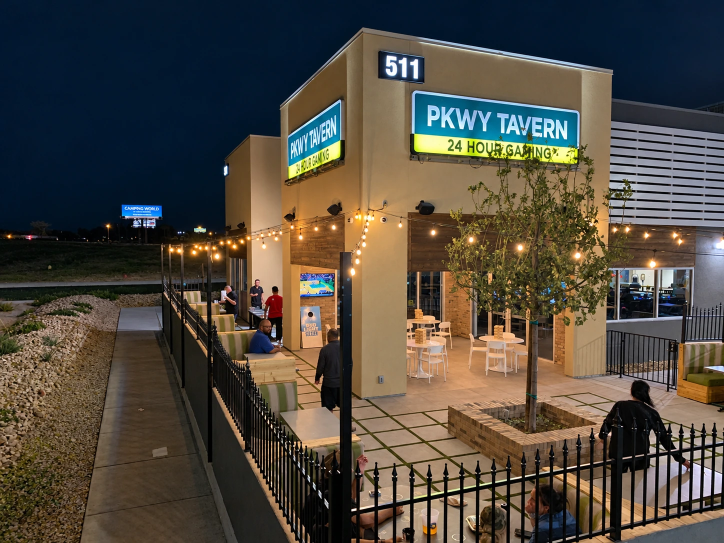 Restaurant exterior at night with patio string lighting